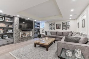 State of the art home entertainment system in basement renovation by Kilbarry Hill